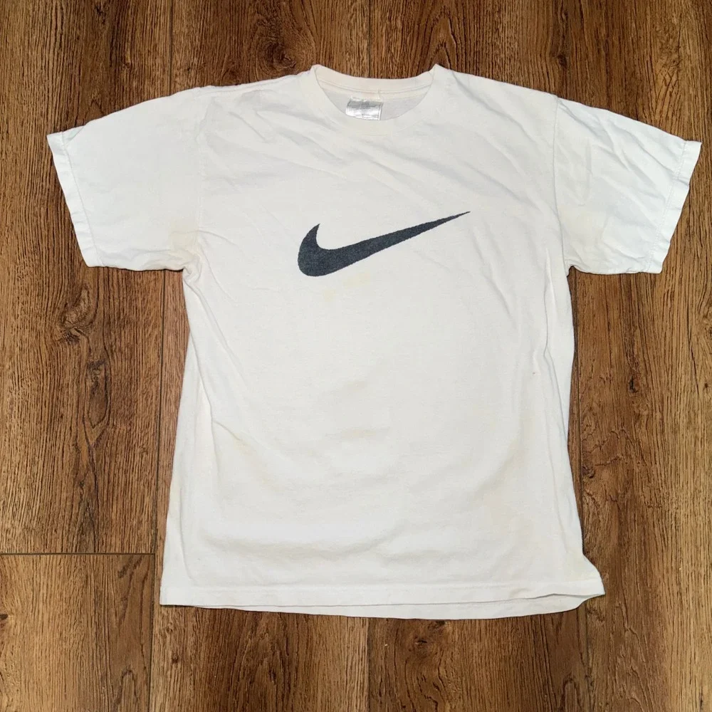 90s Nike center Swoosh Graphic T-Shirt White youth Large Made in USA vtg Tee